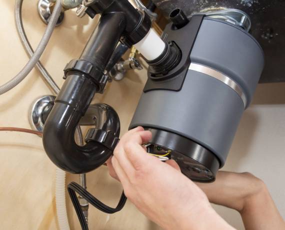 garbage disposal plumber